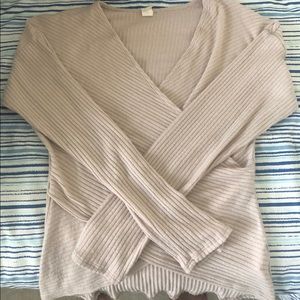 A long sleeve wrap style cotton top